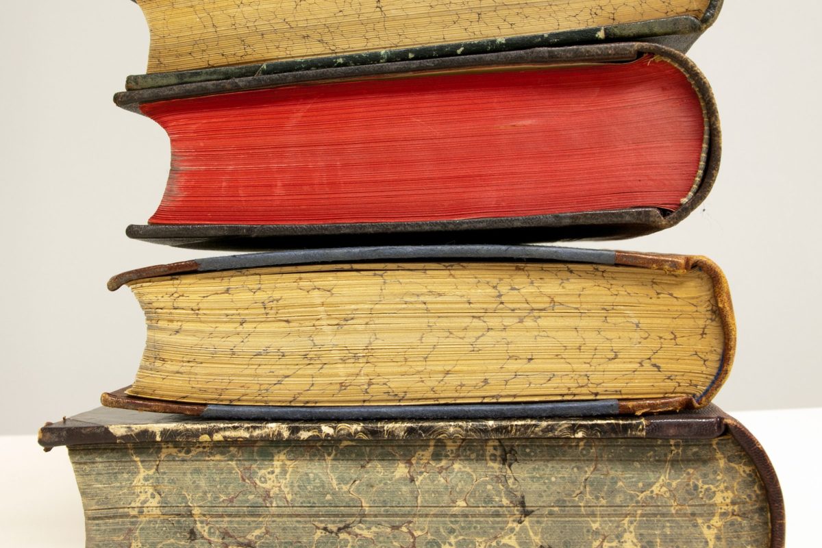 A small stack of antique closed books