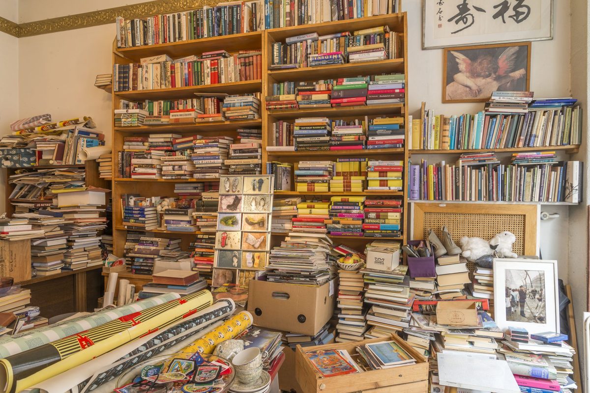 Interior of a secondhand bookshop, floor-to-ceiling shelves